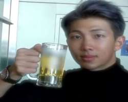 RM (Rapper) consuming alcohol